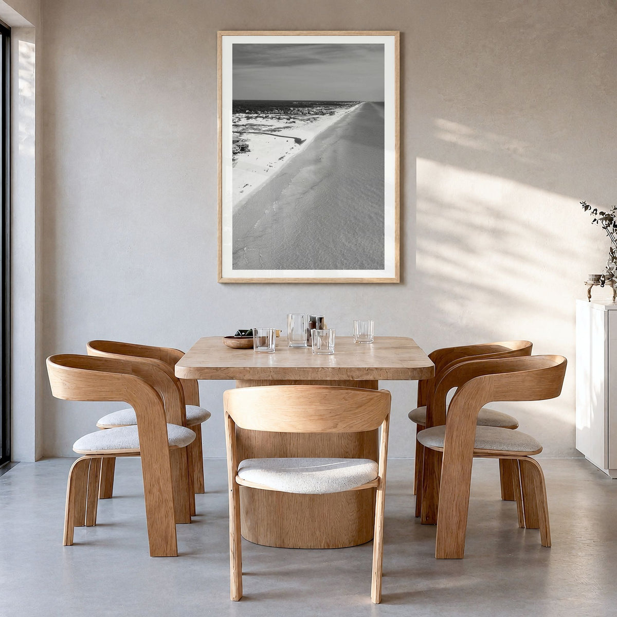 30A Photo Poster in a natural wood frame, hanging in a dining room, white border