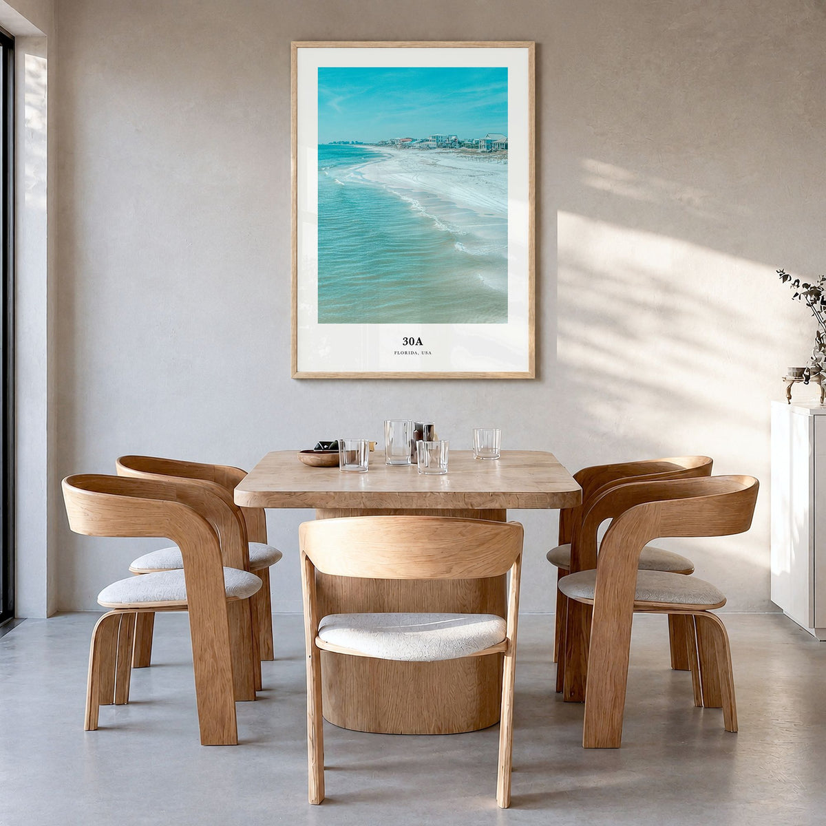 30A Classic Poster in a natural wood frame, hanging in a dining room