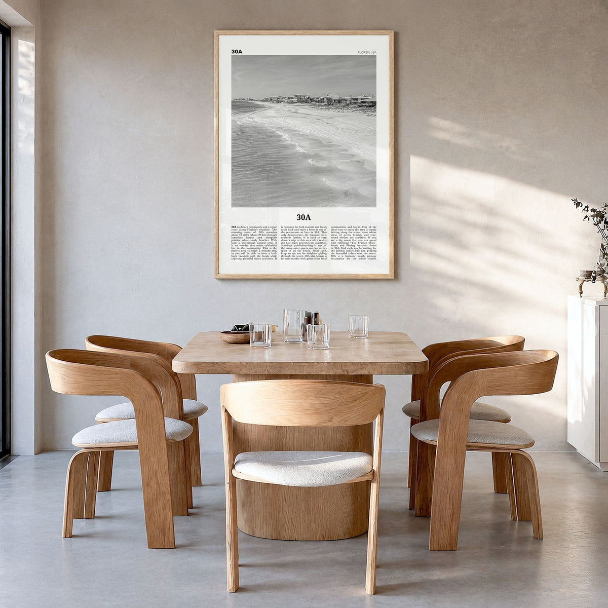 30A Newspaper Poster in a natural wood frame, hanging in a dining room
