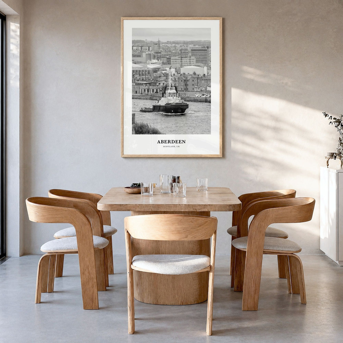 Aberdeen Classic Poster in a natural wood frame, hanging in a dining room