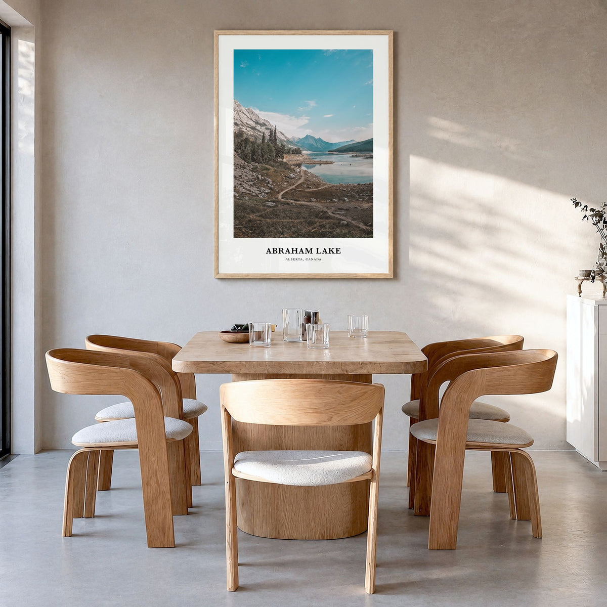 Abraham Lake Classic Poster in a natural wood frame, hanging in a dining room