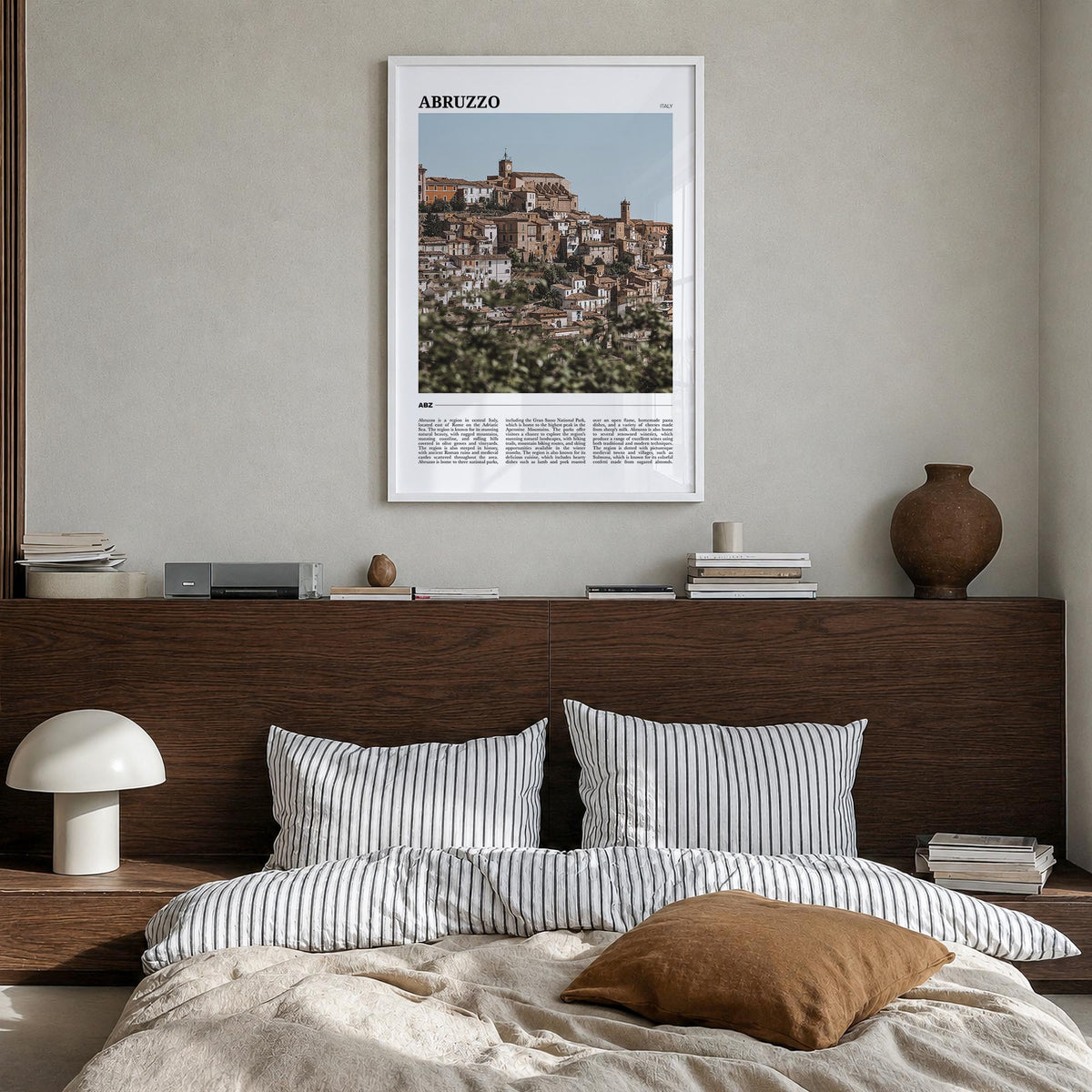 Abruzzo no. 1 colorful travel poster of Italy – vertical wall art in white wood frame, hanging on wall