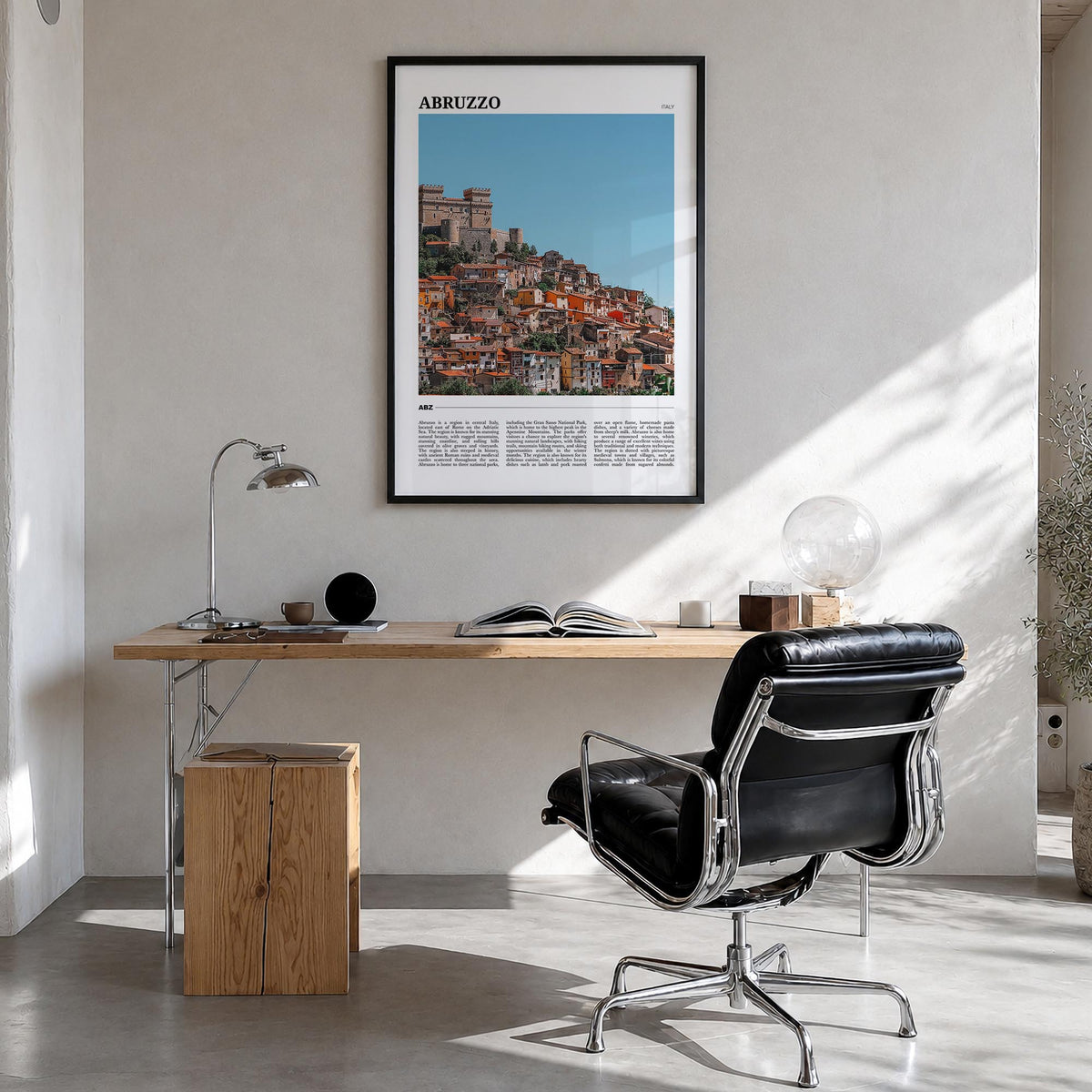 Abruzzo no. 2 colorful travel poster of Italy – vertical wall art in black wood frame, hanging on wall