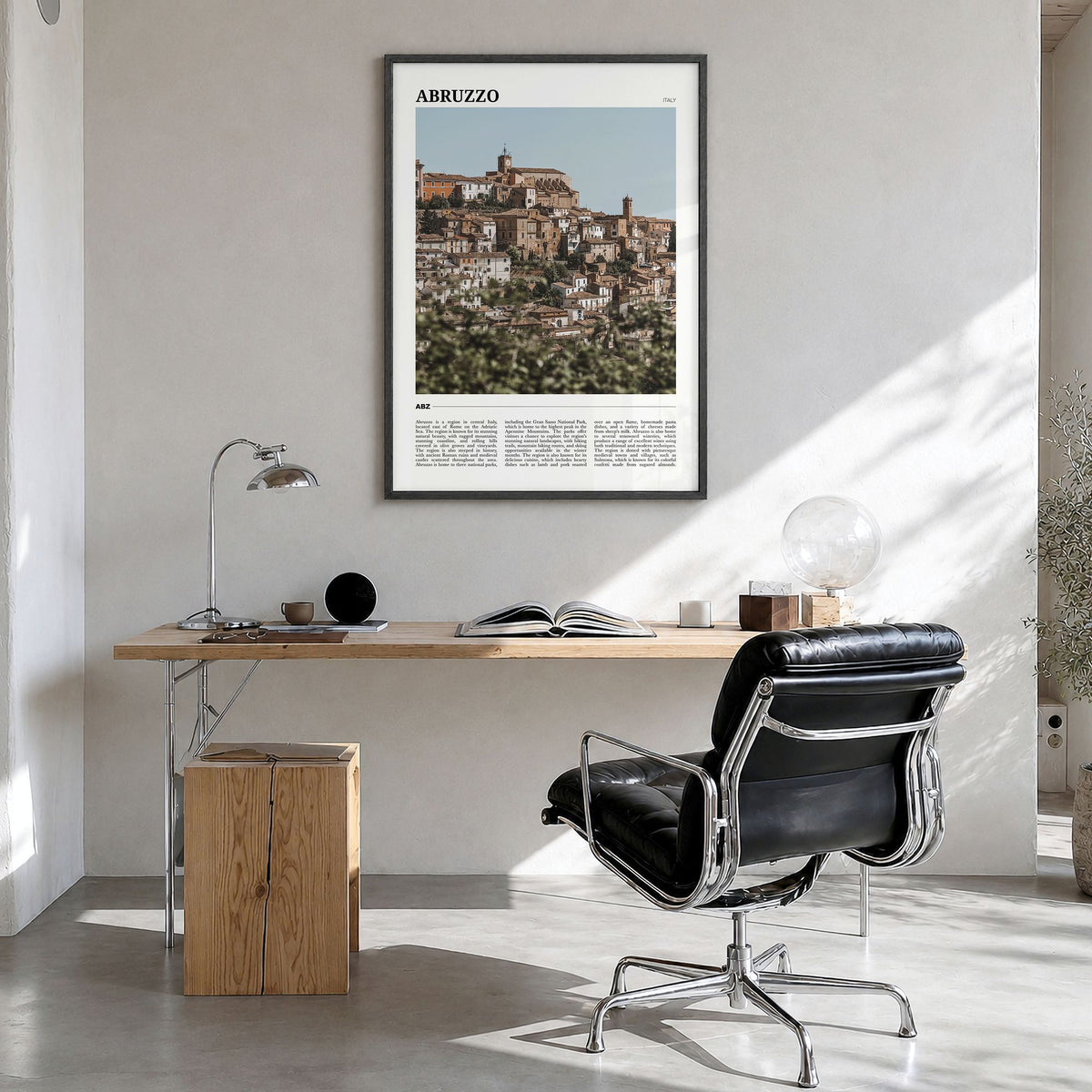 Abruzzo Travel No 1 Poster in a black wood frame, hanging in a bright home office