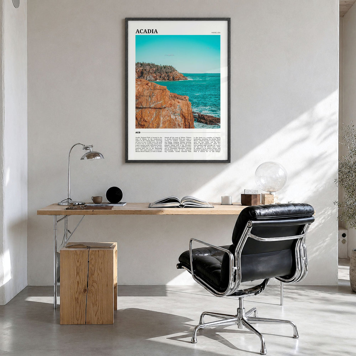 Acadia National Park Travel Poster in a black wood frame, hanging in a bright home office