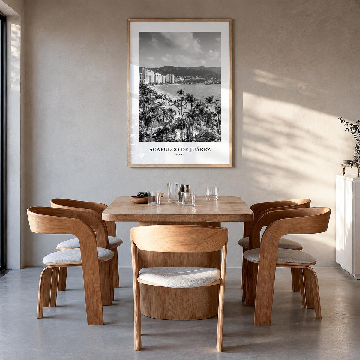 Acapulco de Juárez black & white classic poster of Mexico – vertical wall art in natural wood frame, hanging on wall