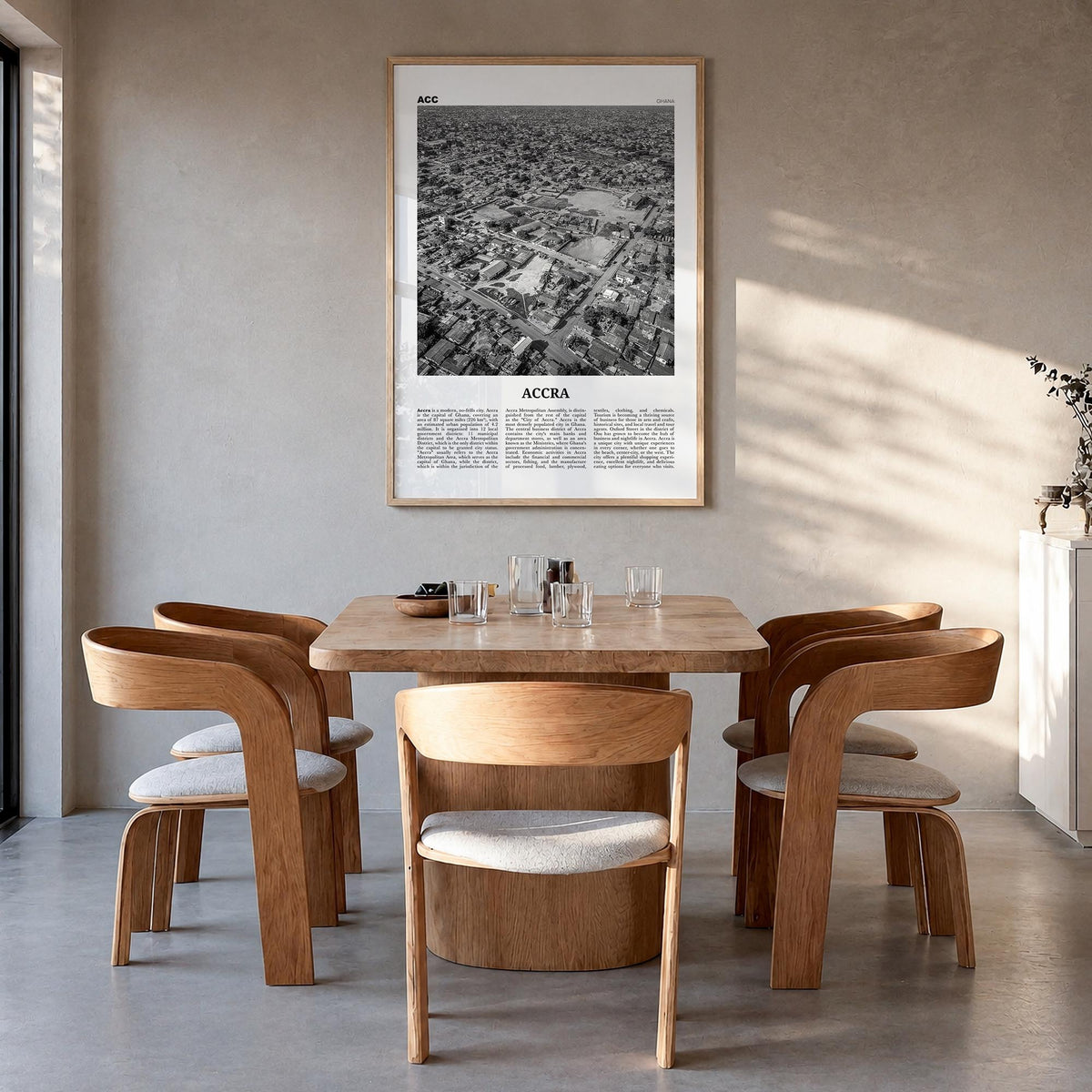 Accra black & white newspaper poster of Ghana – vertical wall art in natural wood frame, hanging on wall