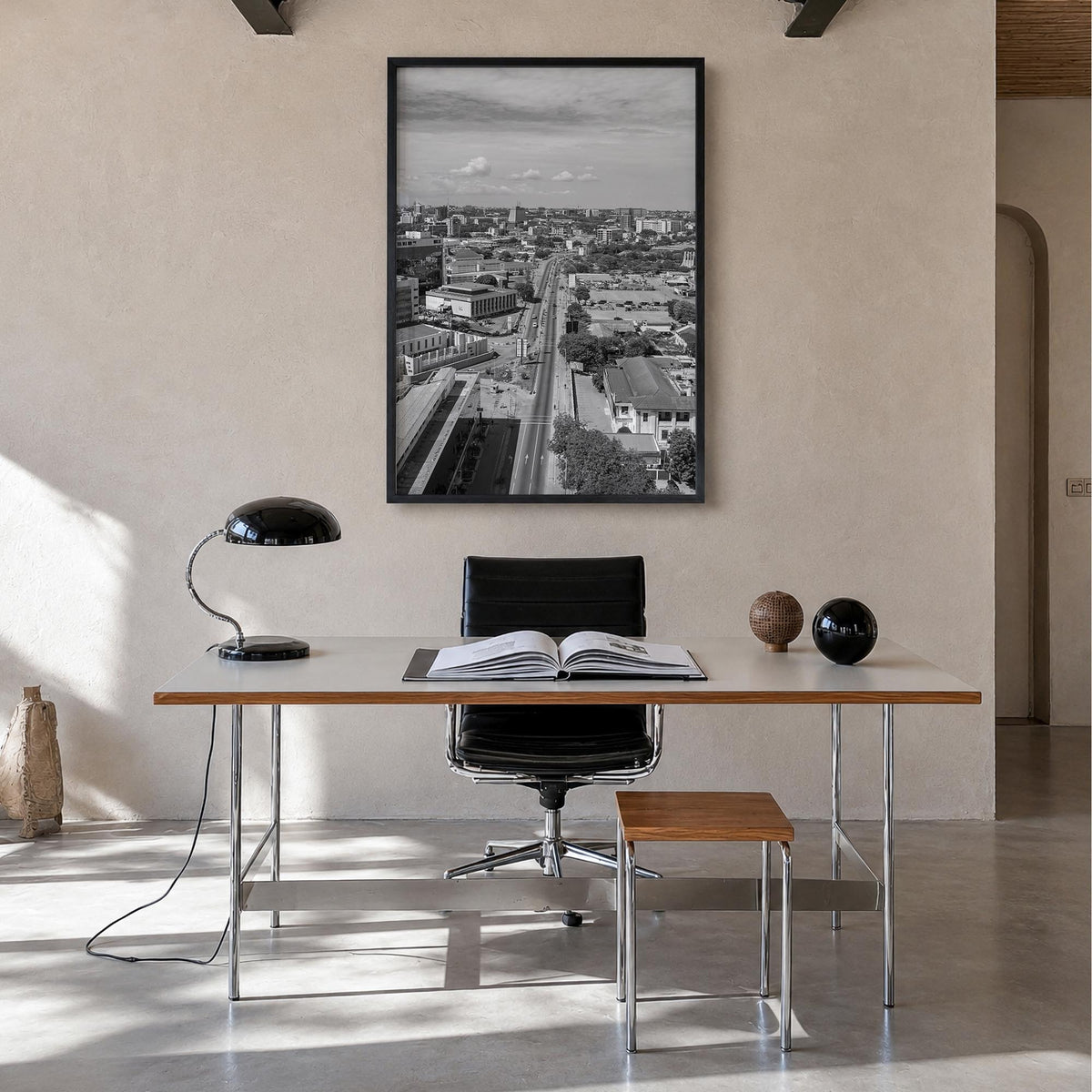 Accra black & white photo poster of Ghana – vertical wall art in black wood frame, hanging on wall