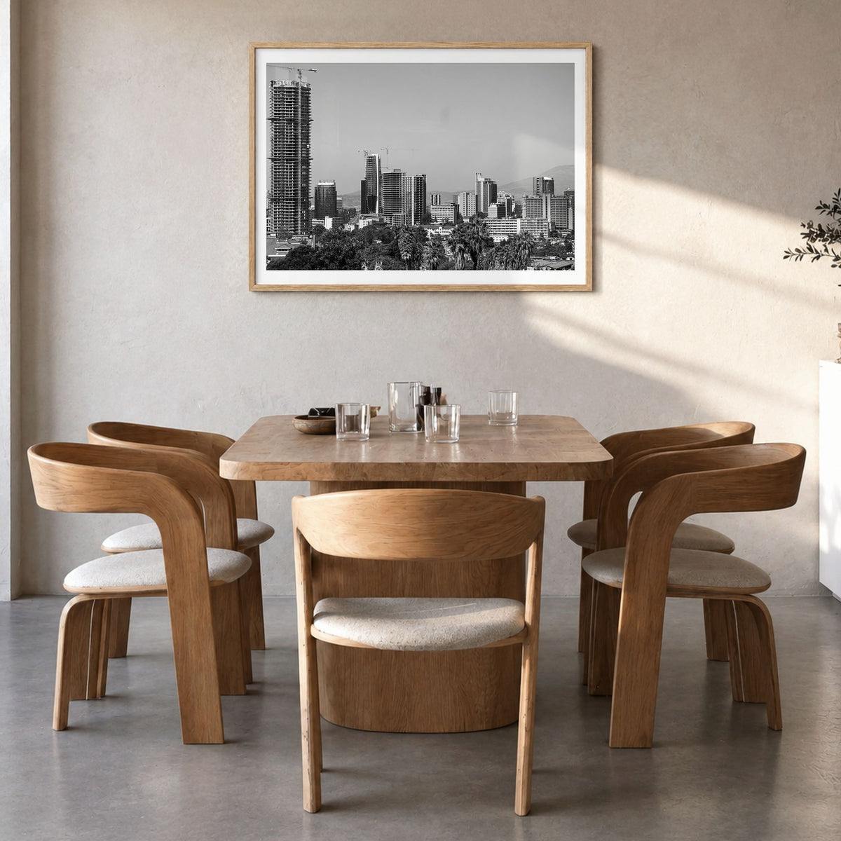 Addis Ababa Photo Poster in a natural wood frame, hanging in a dining room, white border
