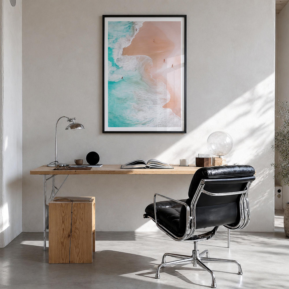 Aerial Beach Waves no. 1 colorful photo poster – vertical wall art in black wood frame with white border, hanging on wall