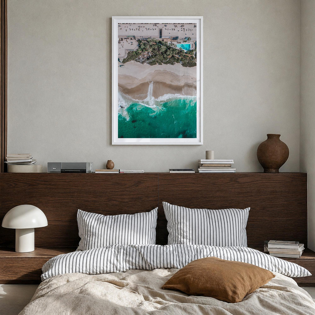 Aerial Beach Waves no. 3 colorful photo poster – vertical wall art in white wood frame with white border, hanging on wall