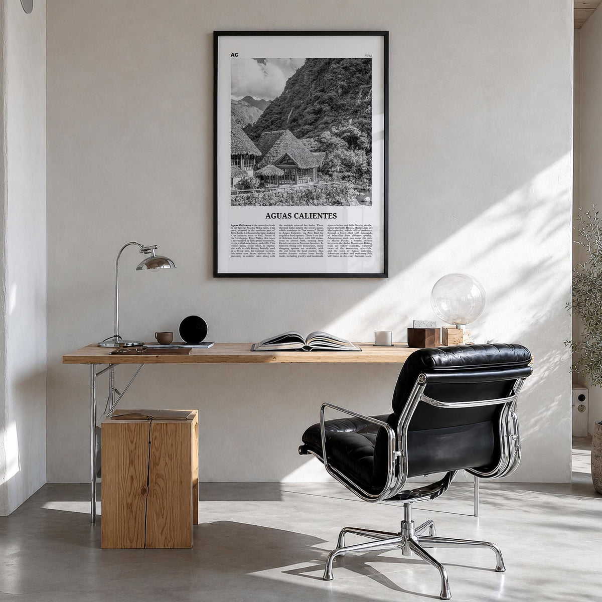 Aguas Calientes black & white newspaper poster of Peru – vertical wall art in black wood frame, hanging on wall