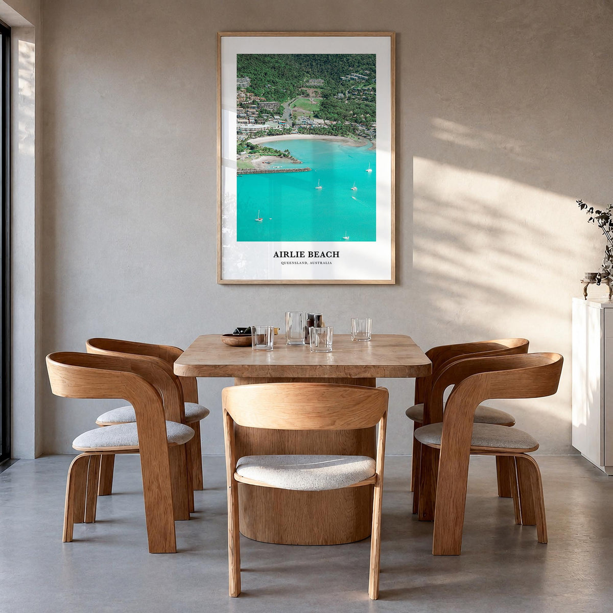Airlie Beach colorful classic poster of Queensland, Australia – vertical wall art in natural wood frame, hanging on wall