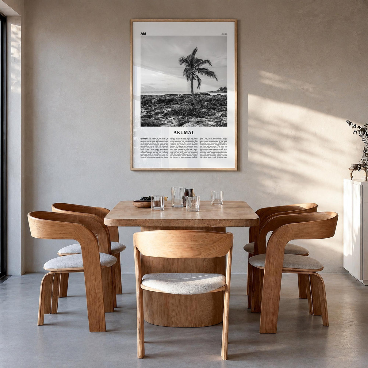 Akumal black & white newspaper poster of Mexico – vertical wall art in natural wood frame, hanging on wall