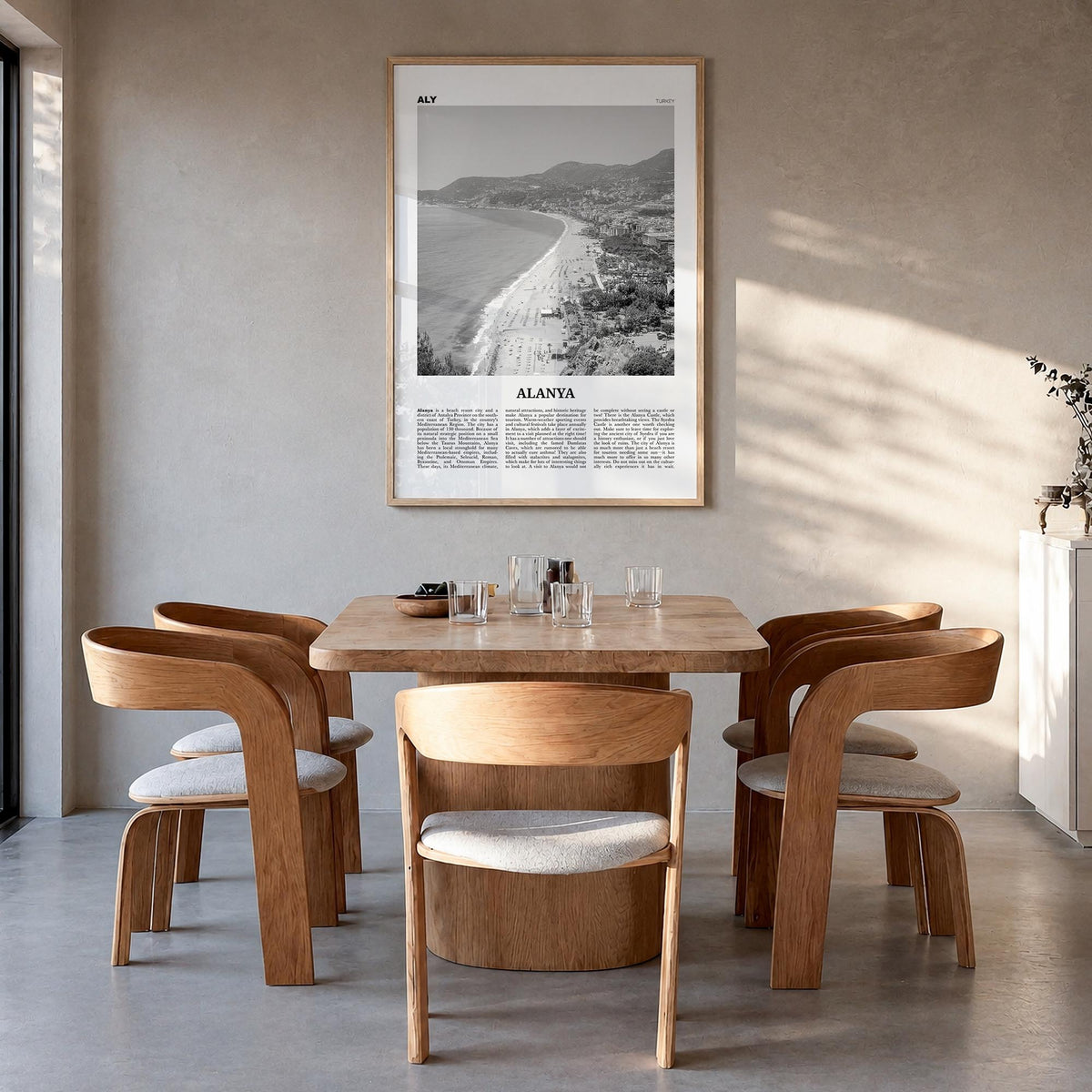 Alanya black & white newspaper poster of Türkiye – vertical wall art in natural wood frame, hanging on wall