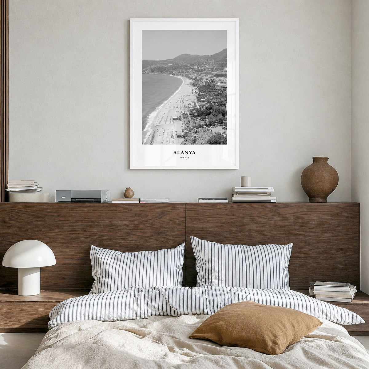 Alanya Classic Poster in a white wood frame, hanging in a bedroom