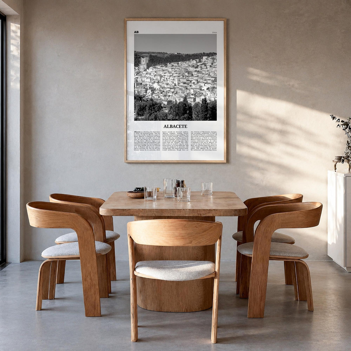 Albacete black & white newspaper poster of Spain – vertical wall art in natural wood frame, hanging on wall