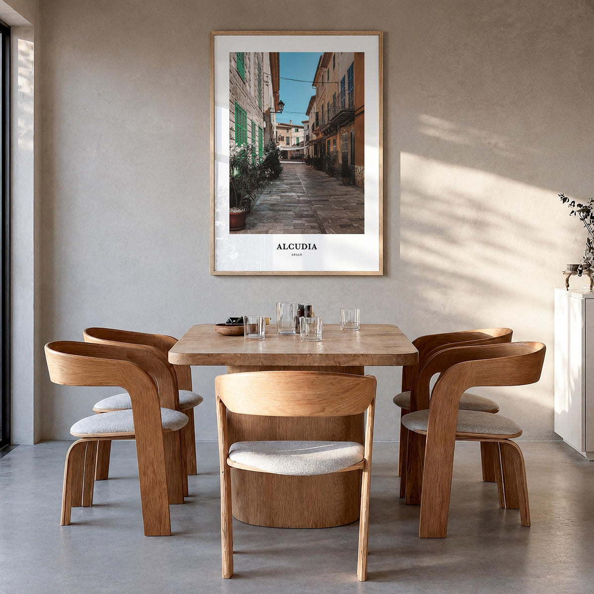 Alcudia colorful classic poster of Spain – vertical wall art in natural wood frame, hanging on wall