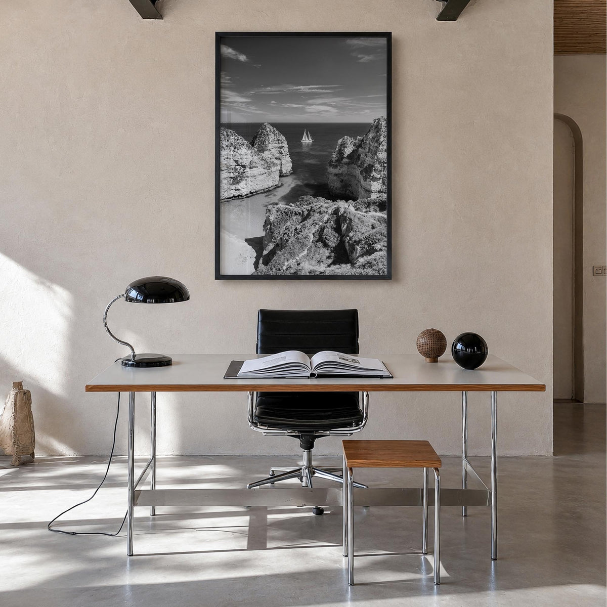 Algarve black & white photo poster of Portugal – vertical wall art in black wood frame, hanging on wall
