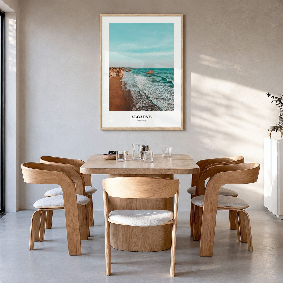 Algarve Classic Poster in a natural wood frame, hanging in a dining room