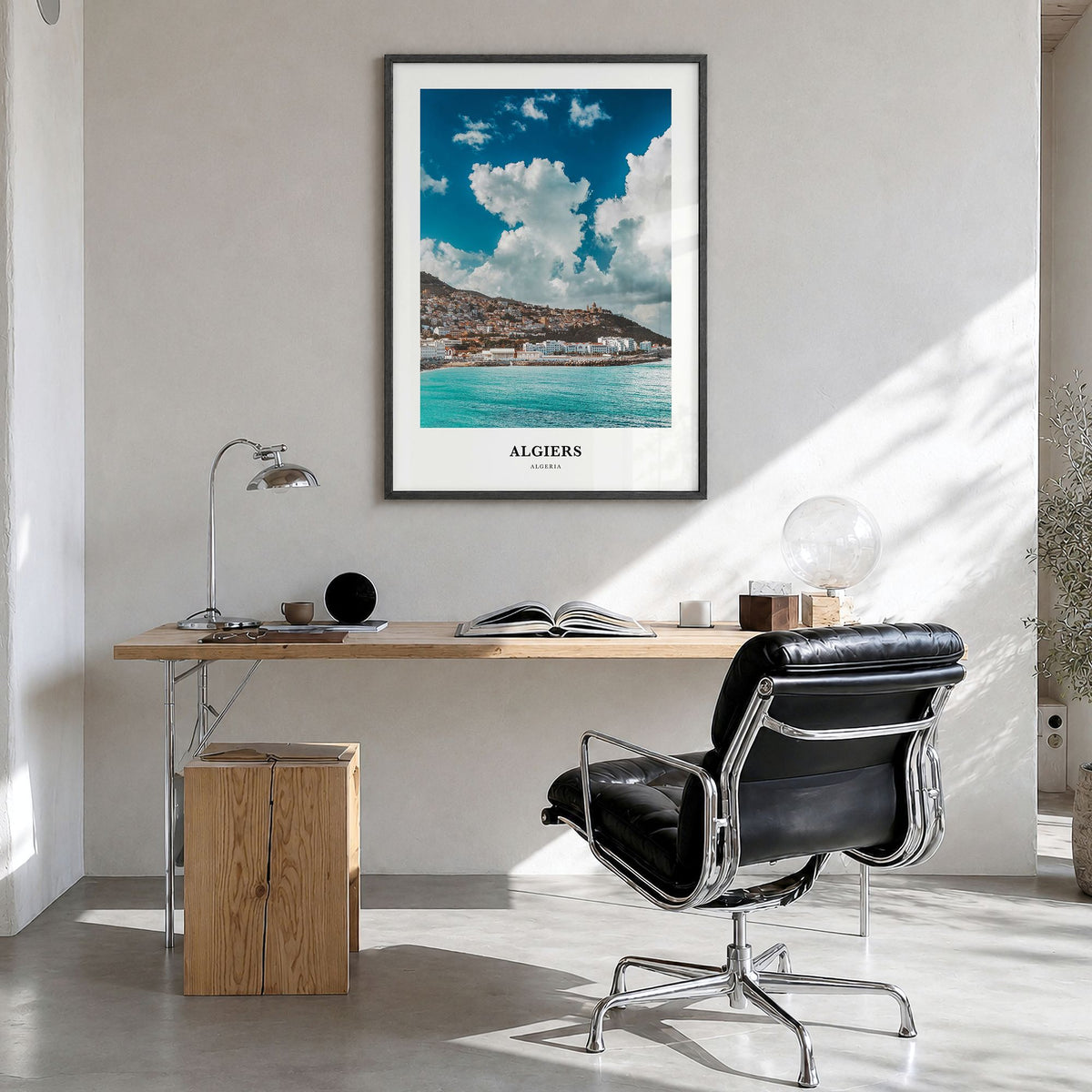 Algiers Classic Poster in a black wood frame, hanging in a bright home office