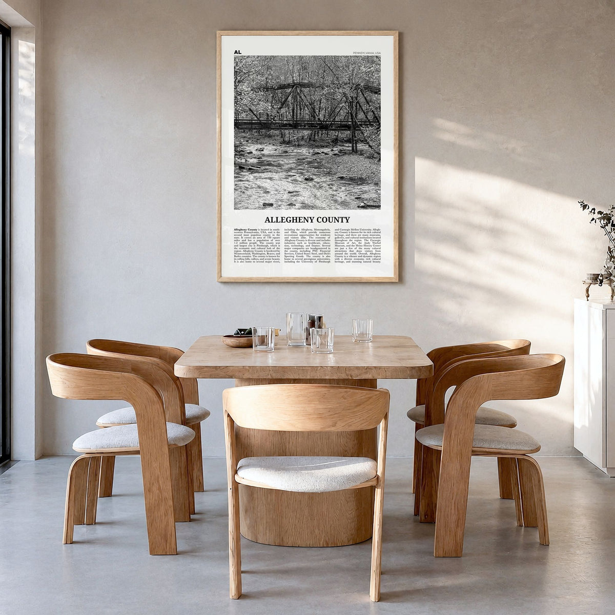 Allegheny County Newspaper Poster in a natural wood frame, hanging in a dining room