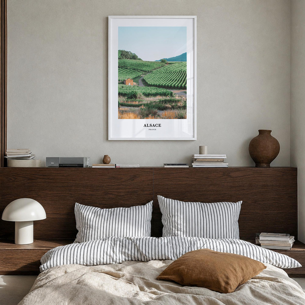 Alsace colorful classic poster of France – vertical wall art in white wood frame, hanging on wall