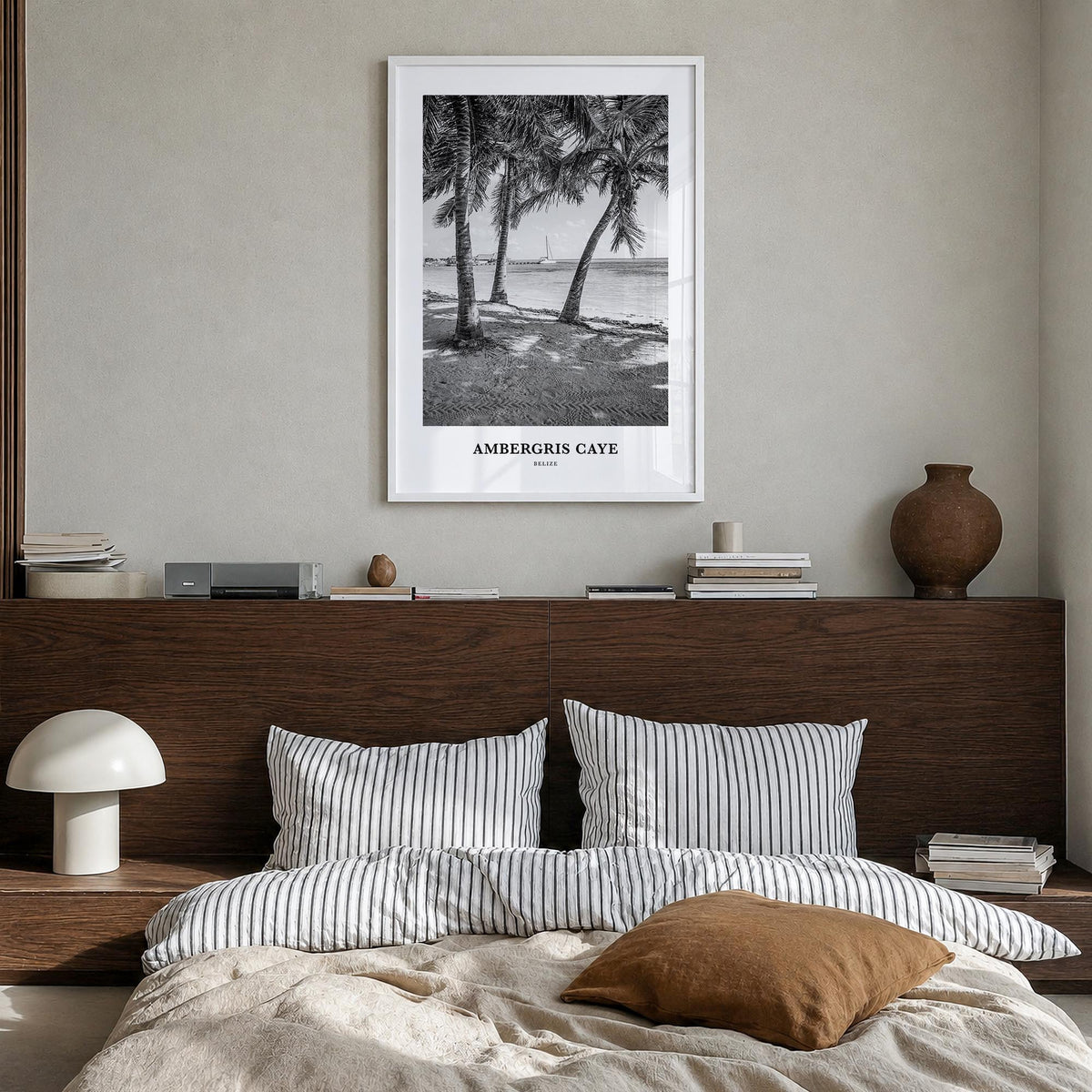 Ambergris Caye black & white classic poster of Belize – vertical wall art in white wood frame, hanging on wall