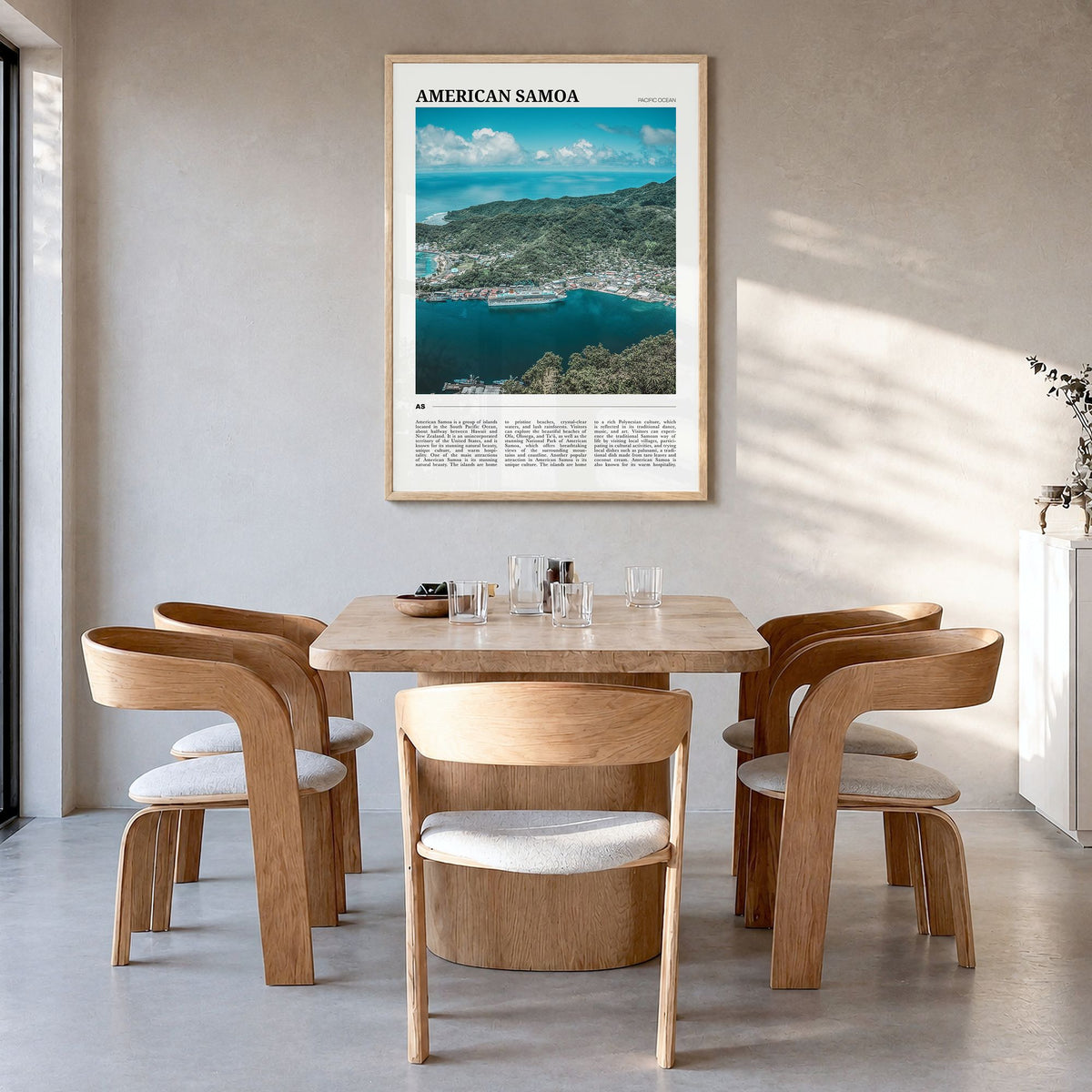 American Samoa Travel Poster in a natural wood frame, hanging in a dining room