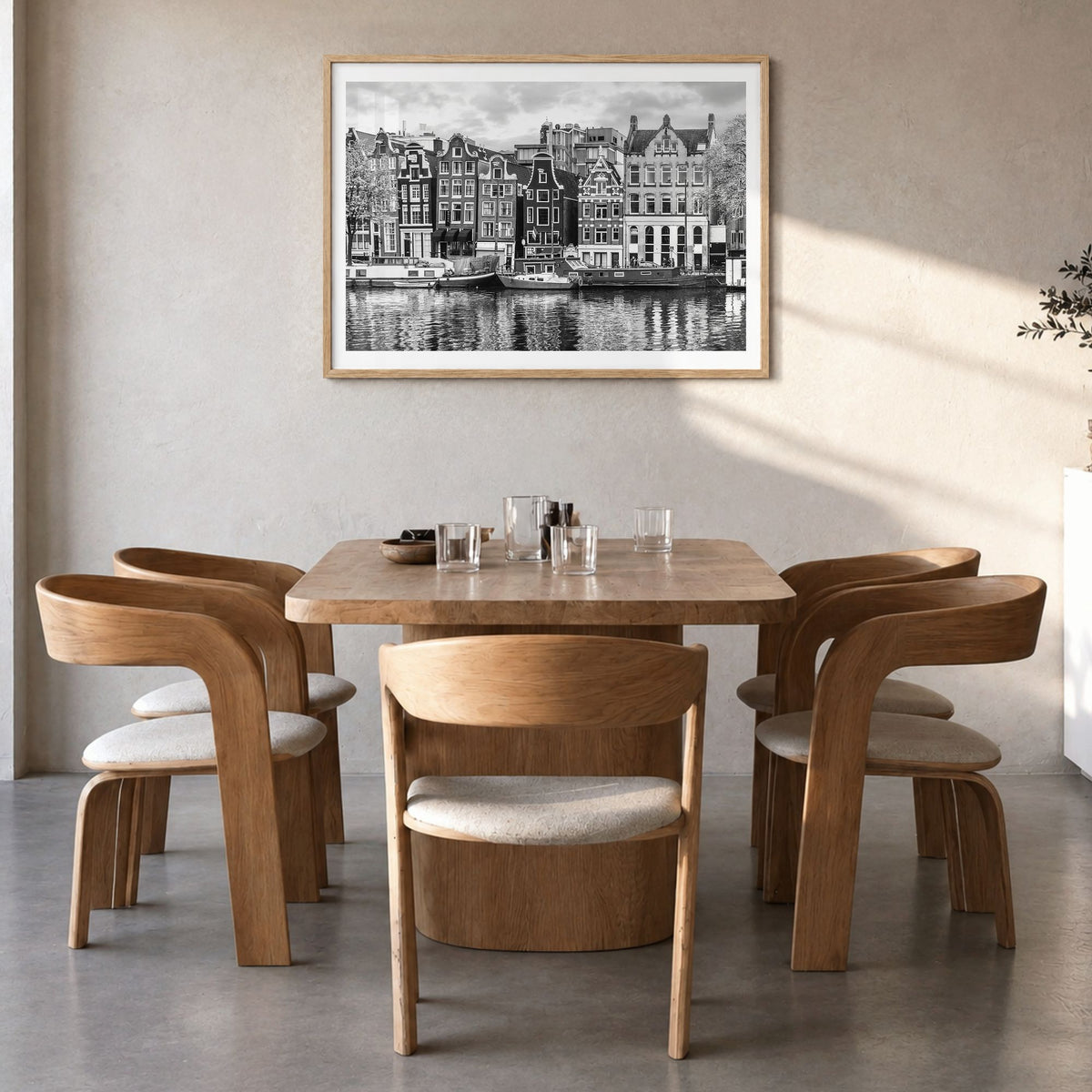 Amsterdam Photo No 2 Poster in a natural wood frame, hanging in a dining room, white border