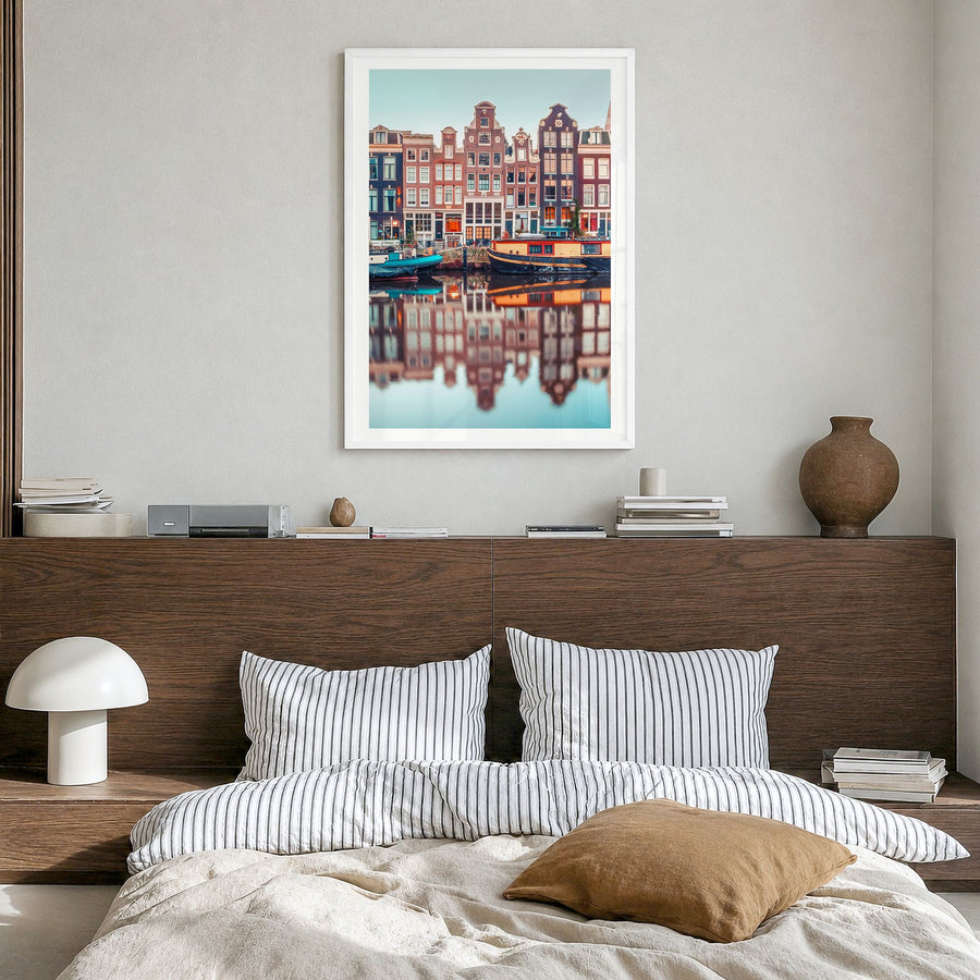 Amsterdam Photo No 1 Poster in a white wood frame, hanging in a bedroom, white border