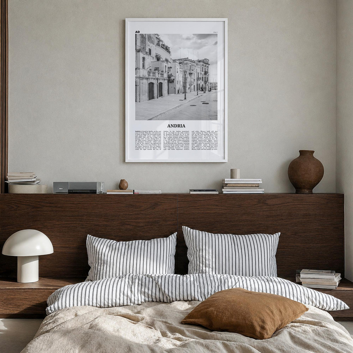 Andria black & white newspaper poster of Italy – vertical wall art in white wood frame, hanging on wall