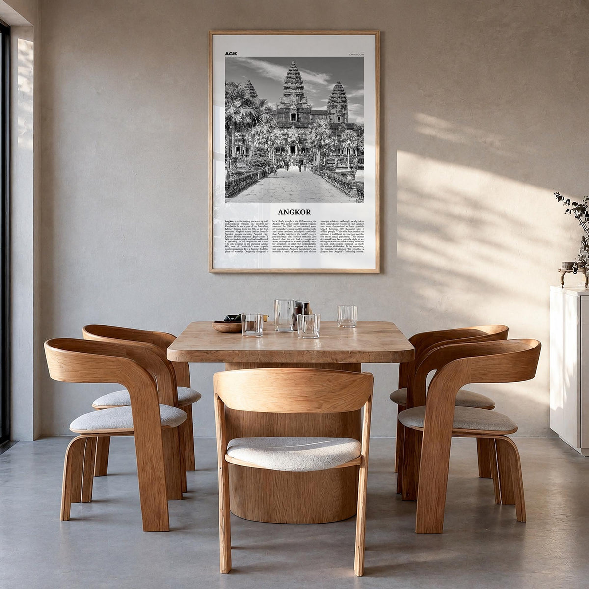 Angkor black & white newspaper poster of Cambodia – vertical wall art in natural wood frame, hanging on wall