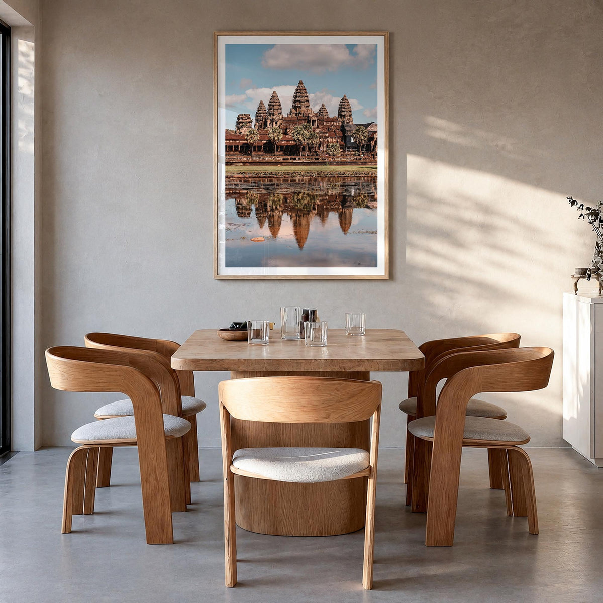 Angkor colorful photo poster of Cambodia – vertical wall art in natural wood frame with white border, hanging on wall