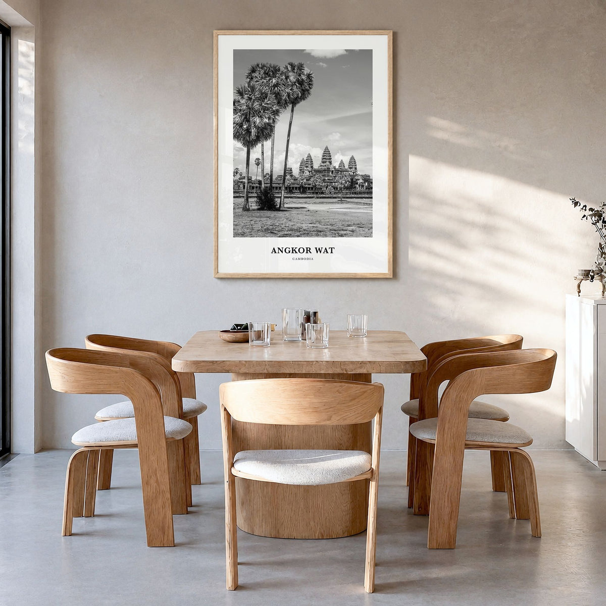 Angkor Wat Classic Poster in a natural wood frame, hanging in a dining room