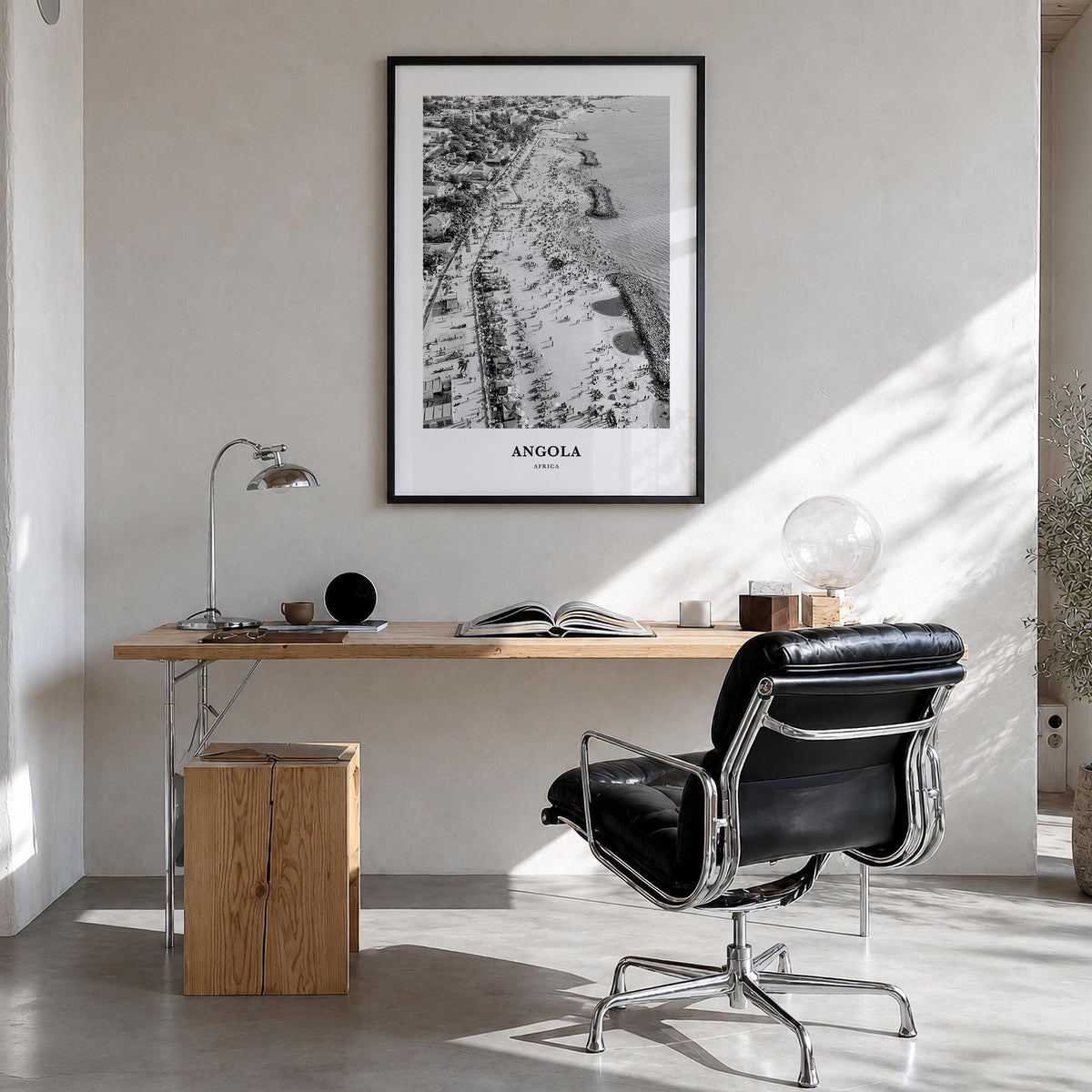 Angola black & white classic poster of Africa – vertical wall art in black wood frame, hanging on wall