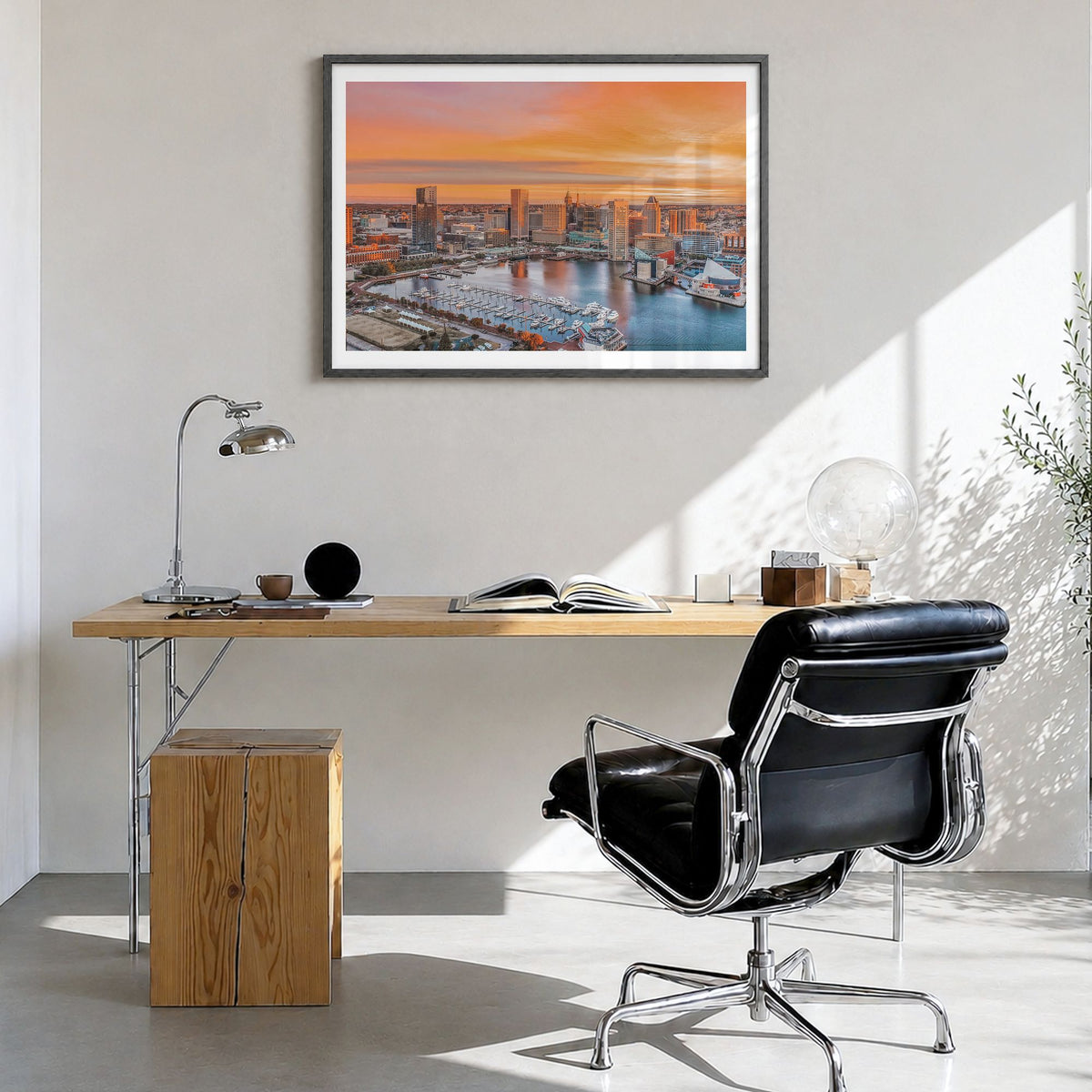 Annapolis Photo Poster in a black wood frame, hanging in a bright home office, white border