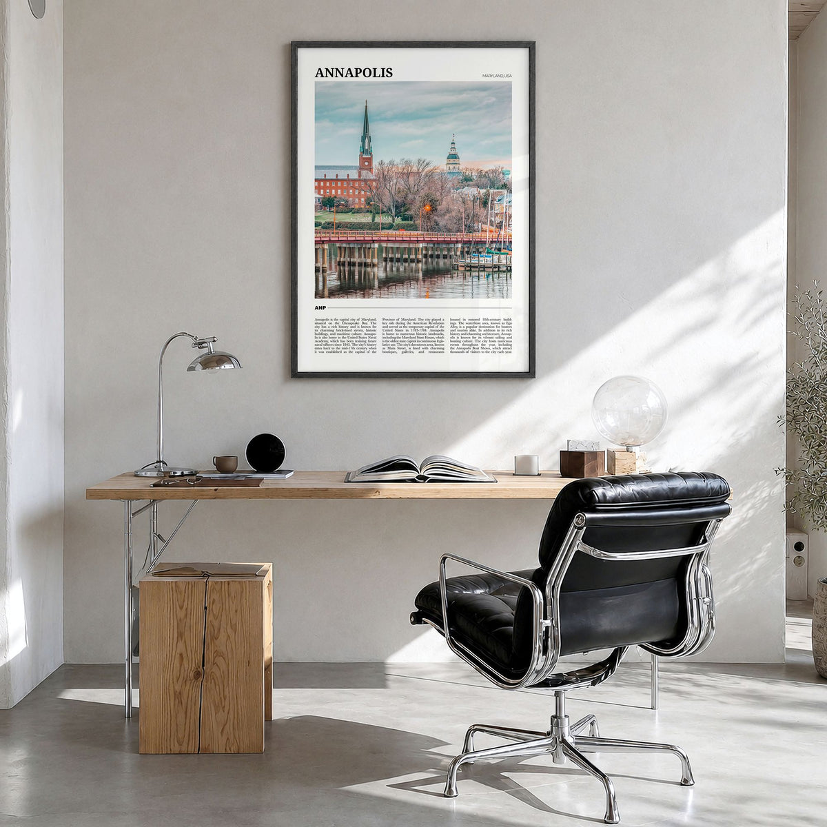 Annapolis Travel Poster in a black wood frame, hanging in a bright home office