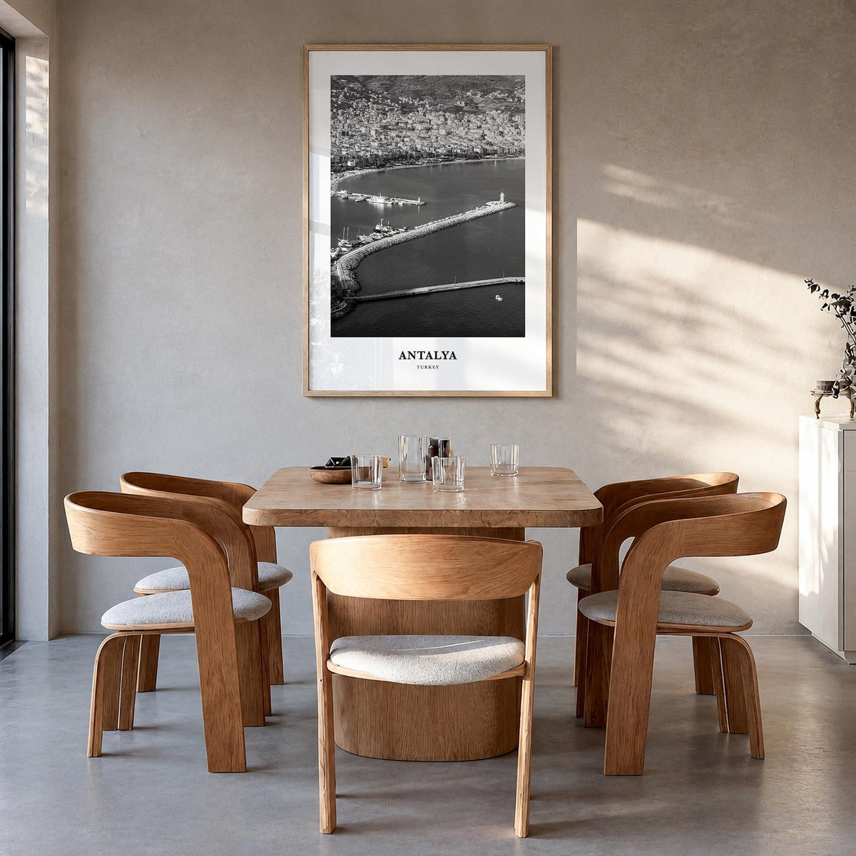 Antalya black & white classic poster of Türkiye – vertical wall art in natural wood frame, hanging on wall
