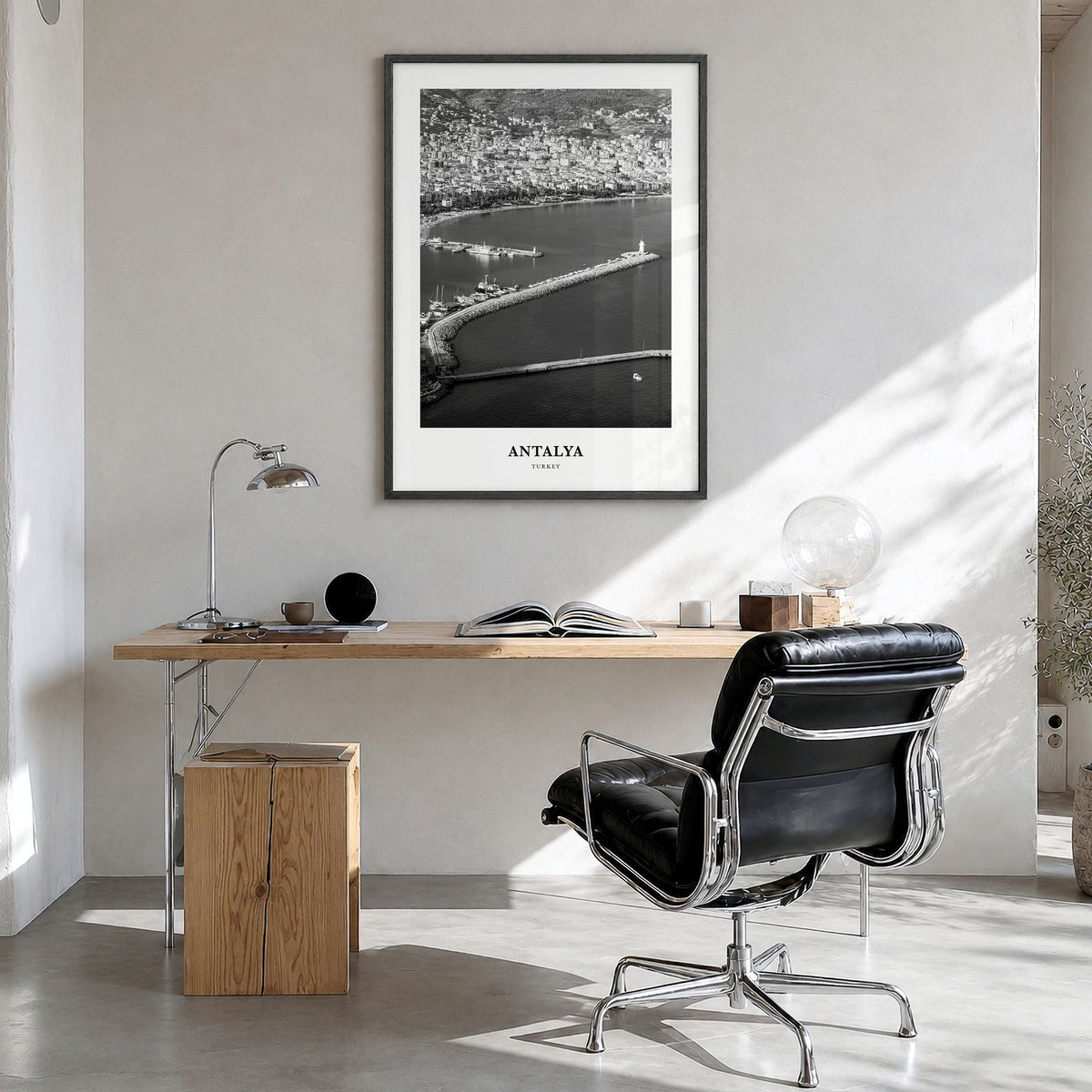 Antalya Classic Poster in a black wood frame, hanging in a bright home office