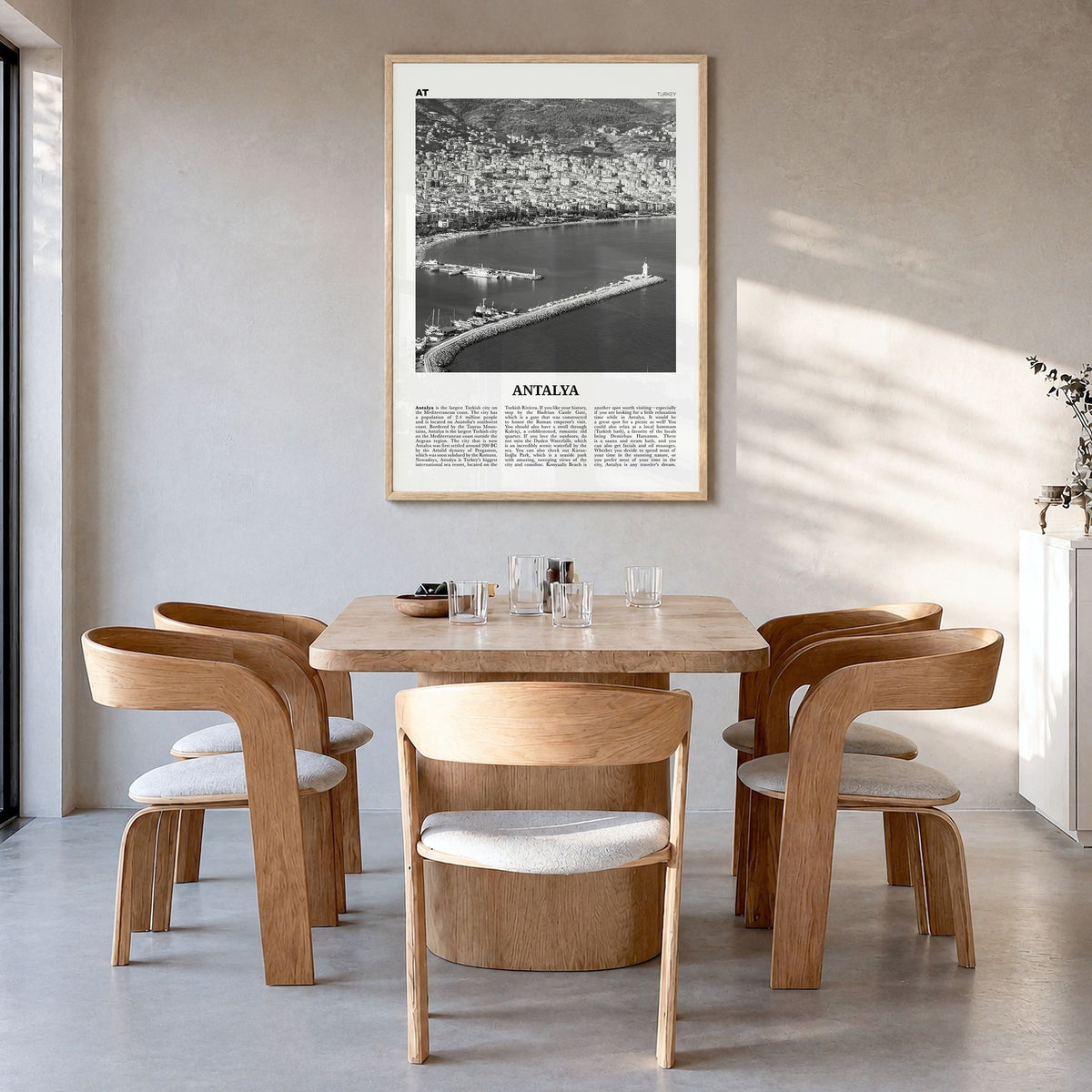Antalya Newspaper Poster in a natural wood frame, hanging in a dining room