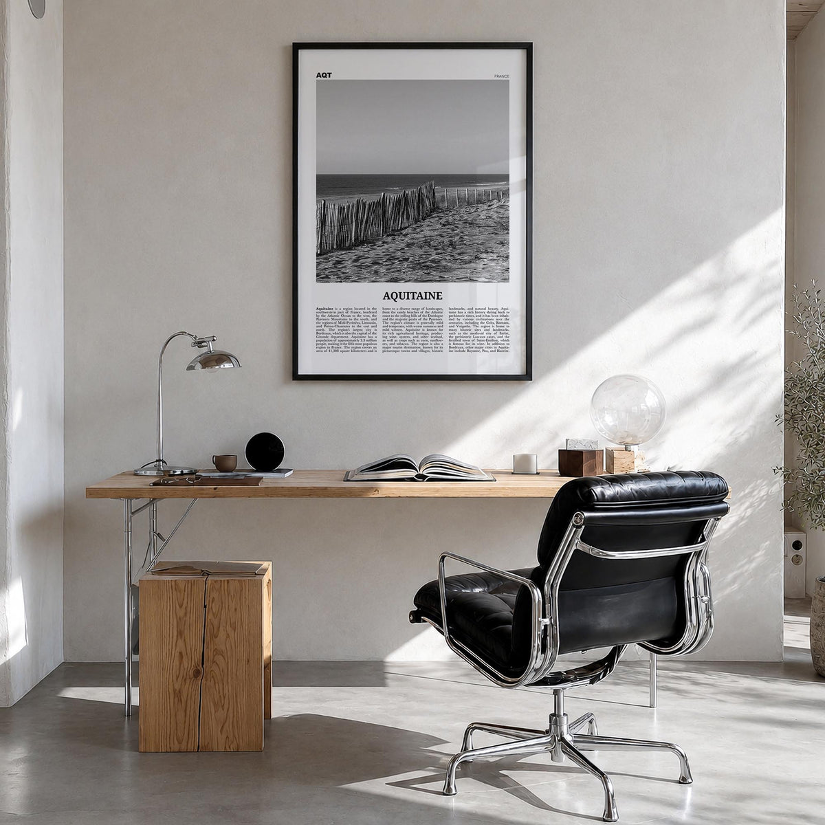 Aquitaine black & white newspaper poster of France – vertical wall art in black wood frame, hanging on wall
