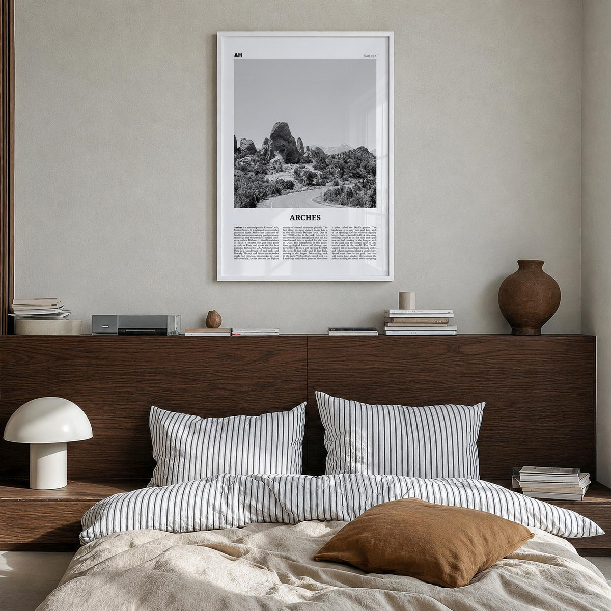 Arches National Park black & white newspaper poster of Utah, USA – vertical wall art in white wood frame, hanging on wall