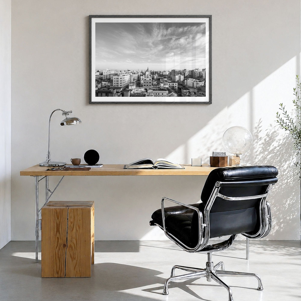 Argentina Photo Poster in a black wood frame, hanging in a bright home office, white border