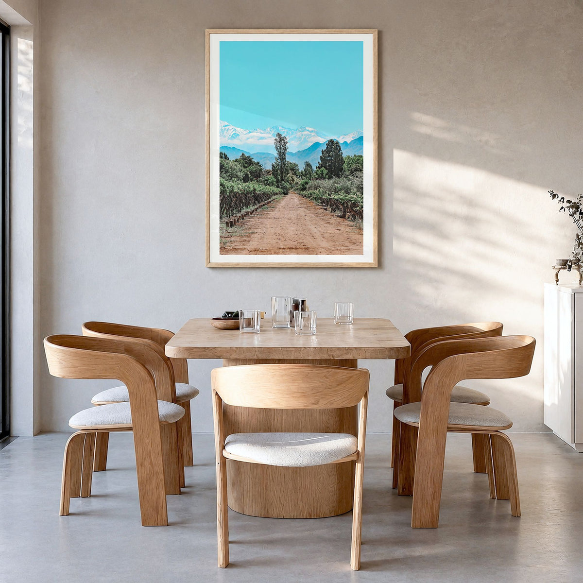 Argentina Photo Poster in a natural wood frame, hanging in a dining room, white border