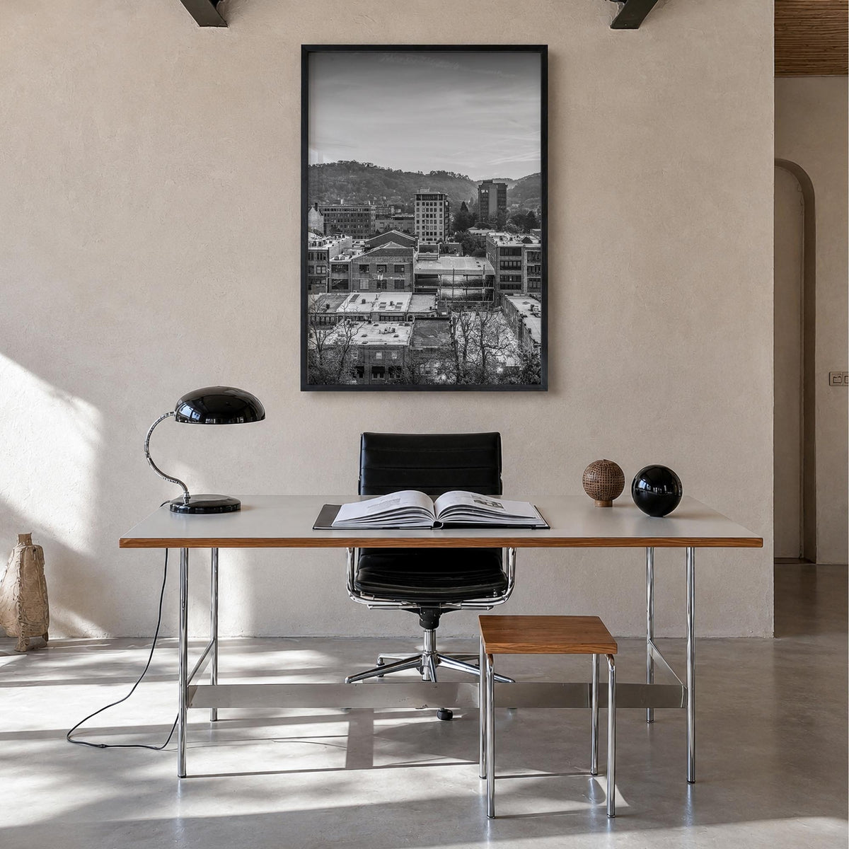 Asheville black & white photo poster of North Carolina, USA – vertical wall art in black wood frame, hanging on wall