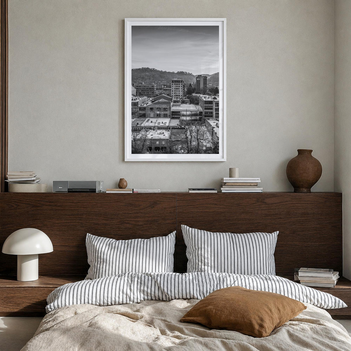 Asheville black & white photo poster of North Carolina, USA – vertical wall art in white wood frame with white border, hangin