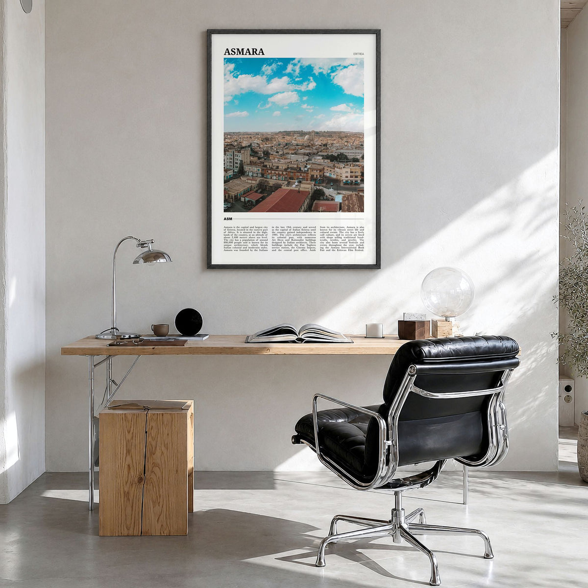 Asmara Travel No 1 Poster in a black wood frame, hanging in a bright home office