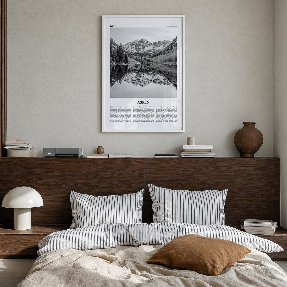 Aspen black & white newspaper poster of Colorado, USA – vertical wall art in white wood frame, hanging on wall
