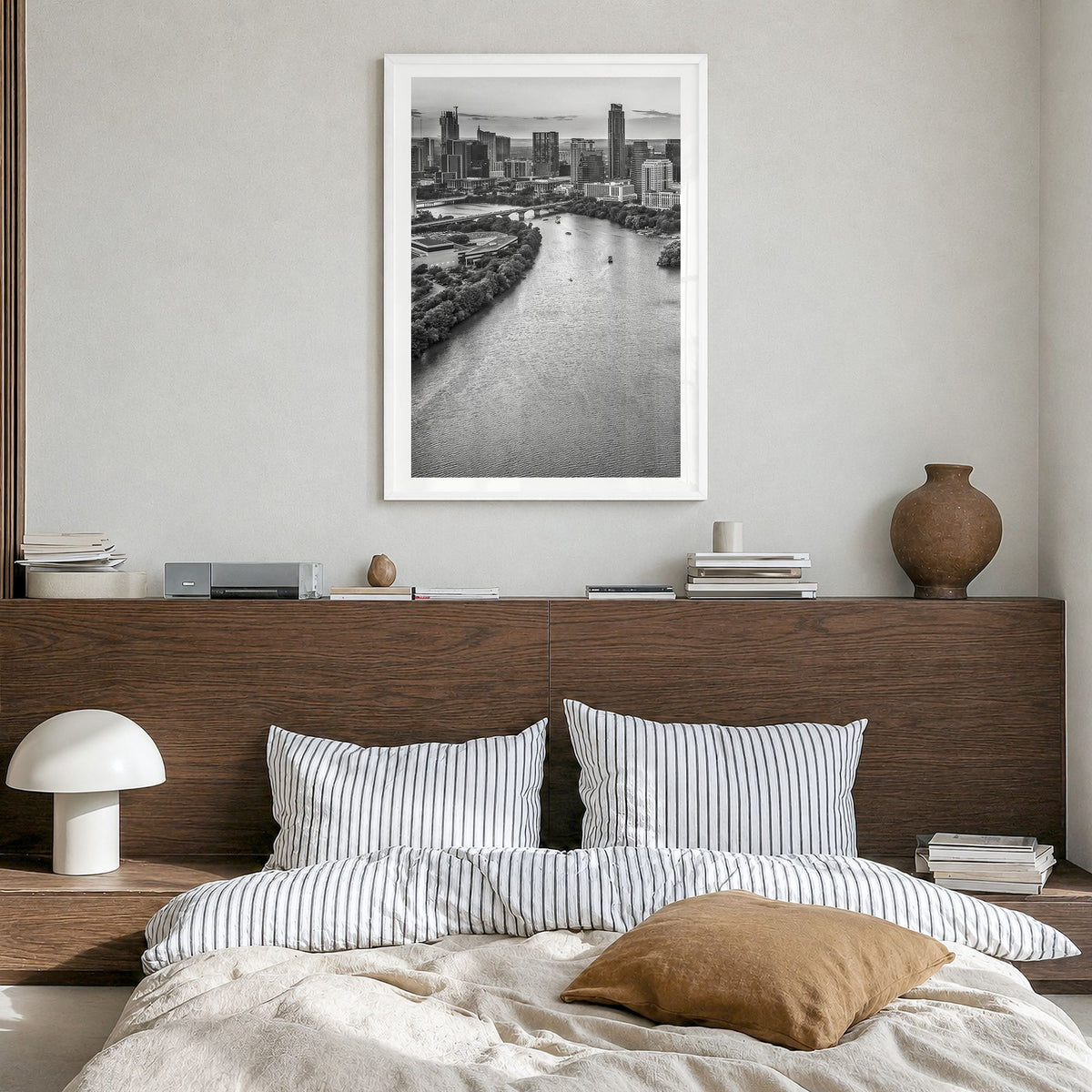 Austin Photo No 1 Poster in a white wood frame, hanging in a bedroom, white border